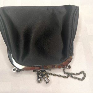 Perllini cute black purse/wallet with perllini insignia.